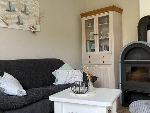 Ferienhaus Nordseejuwel - Wohnzimmeransicht mit Kamin
