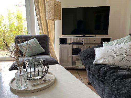 Ferienhaus Nordseejuwel - Wohnzimmer mit TV